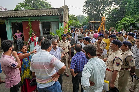Evacuation of land near Belgachia Metro station